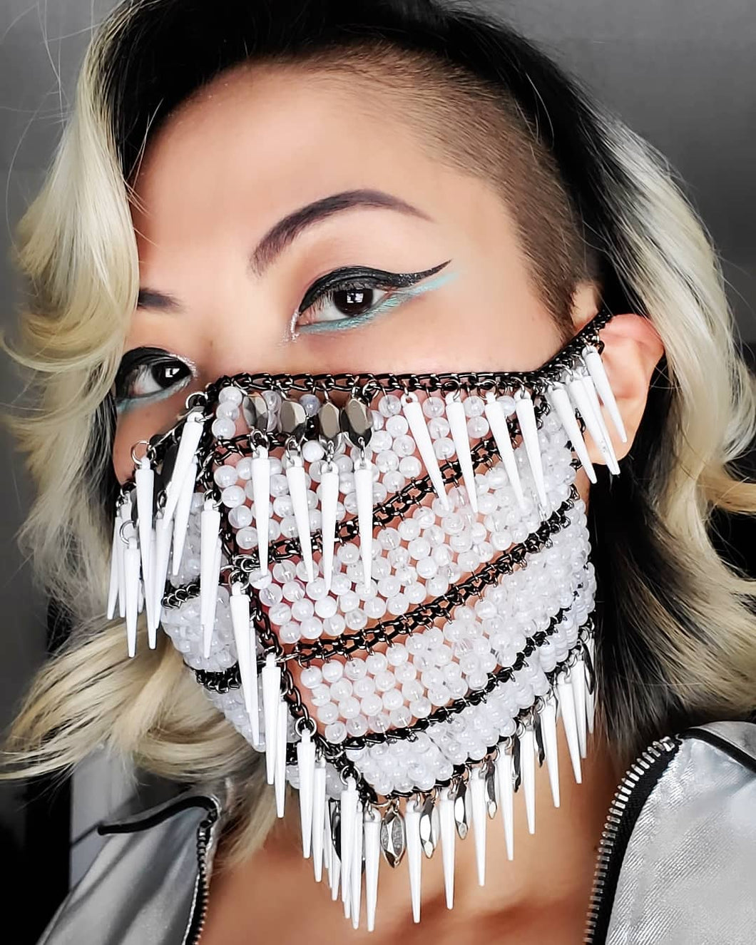 White beaded mask embellishment with spikes